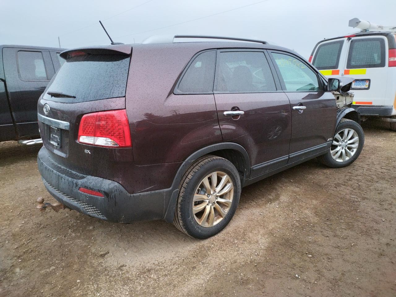 Photo 16 from auction – 2011 KIA SORENTO EX with VIN 5XYKUDA19BG014858