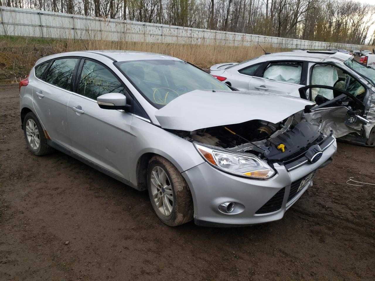 FORD FOCUS SEL 2012 with VIN 1FAHP3M2XCL205717 - Photo from auction