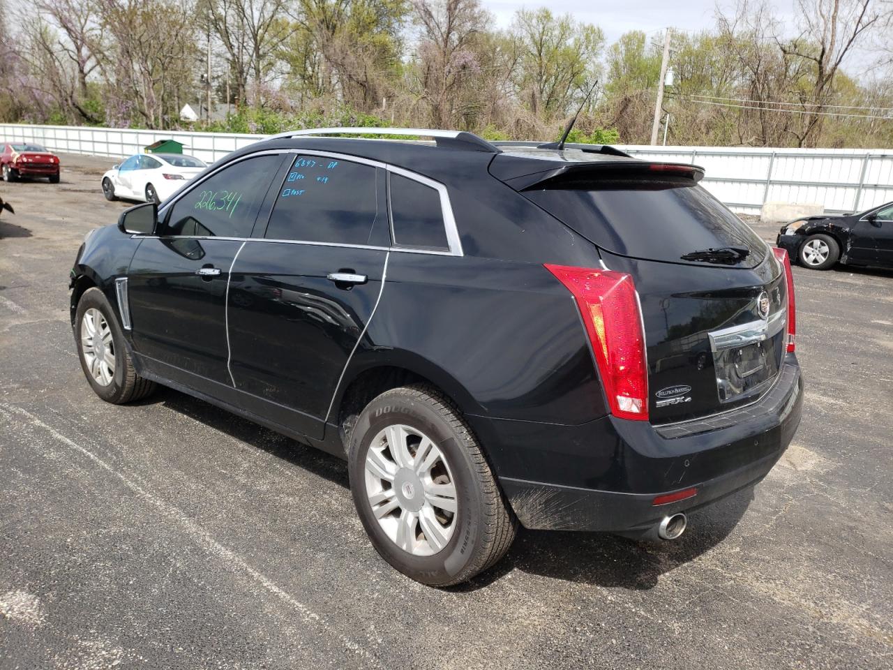 Photo 3 from auction – 2014 CADILLAC SRX LUXURY with VIN 3GYFNEE35ES601457