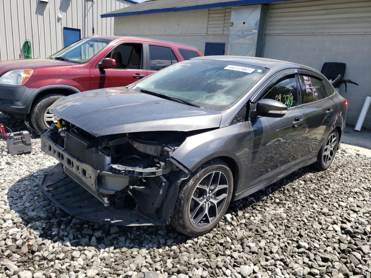 Photo 2 from auction – 2016 FORD FOCUS SE with VIN 1FADP3F29GL385449