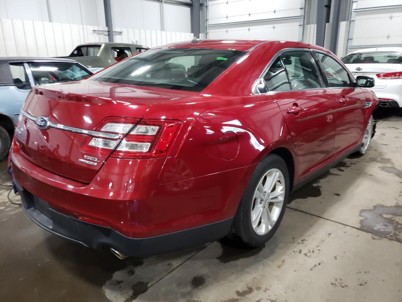 Photo 4 from auction – 2013 FORD TAURUS SEL with VIN 1FAHP2E81DG188085