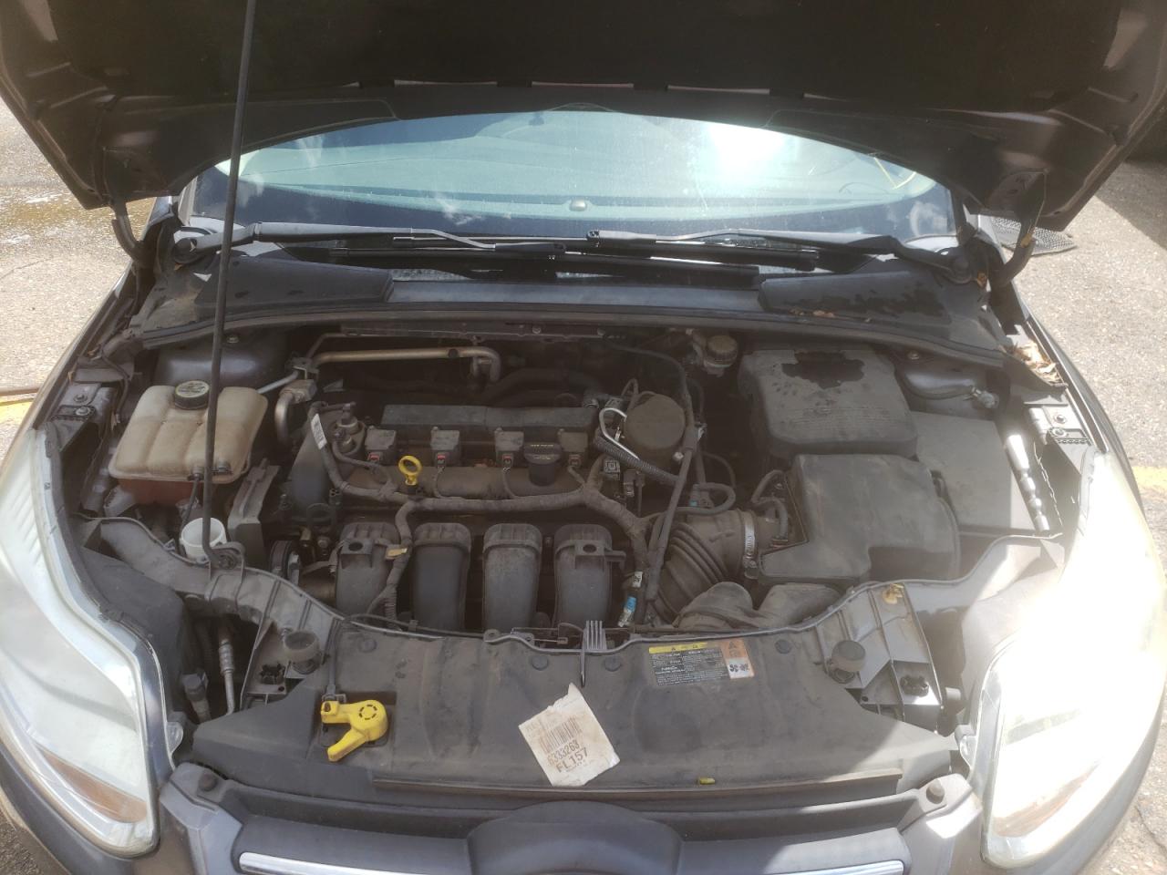 Photo 7 from auction – 2013 FORD FOCUS SE with VIN 1FADP3F26DL359953