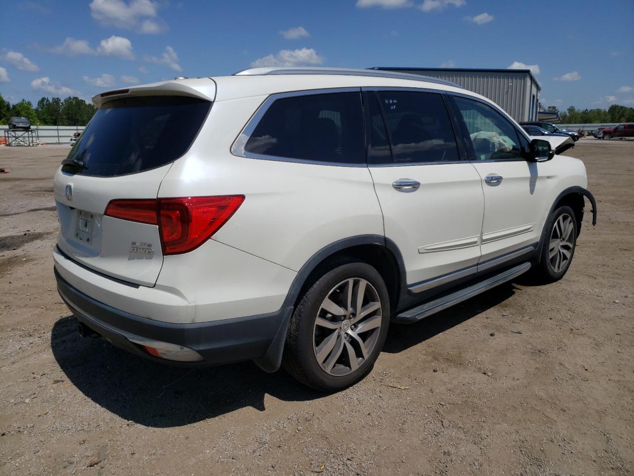 Photo 4 from auction – 2016 HONDA PILOT ELIT with VIN 5FNYF6H01GB116327