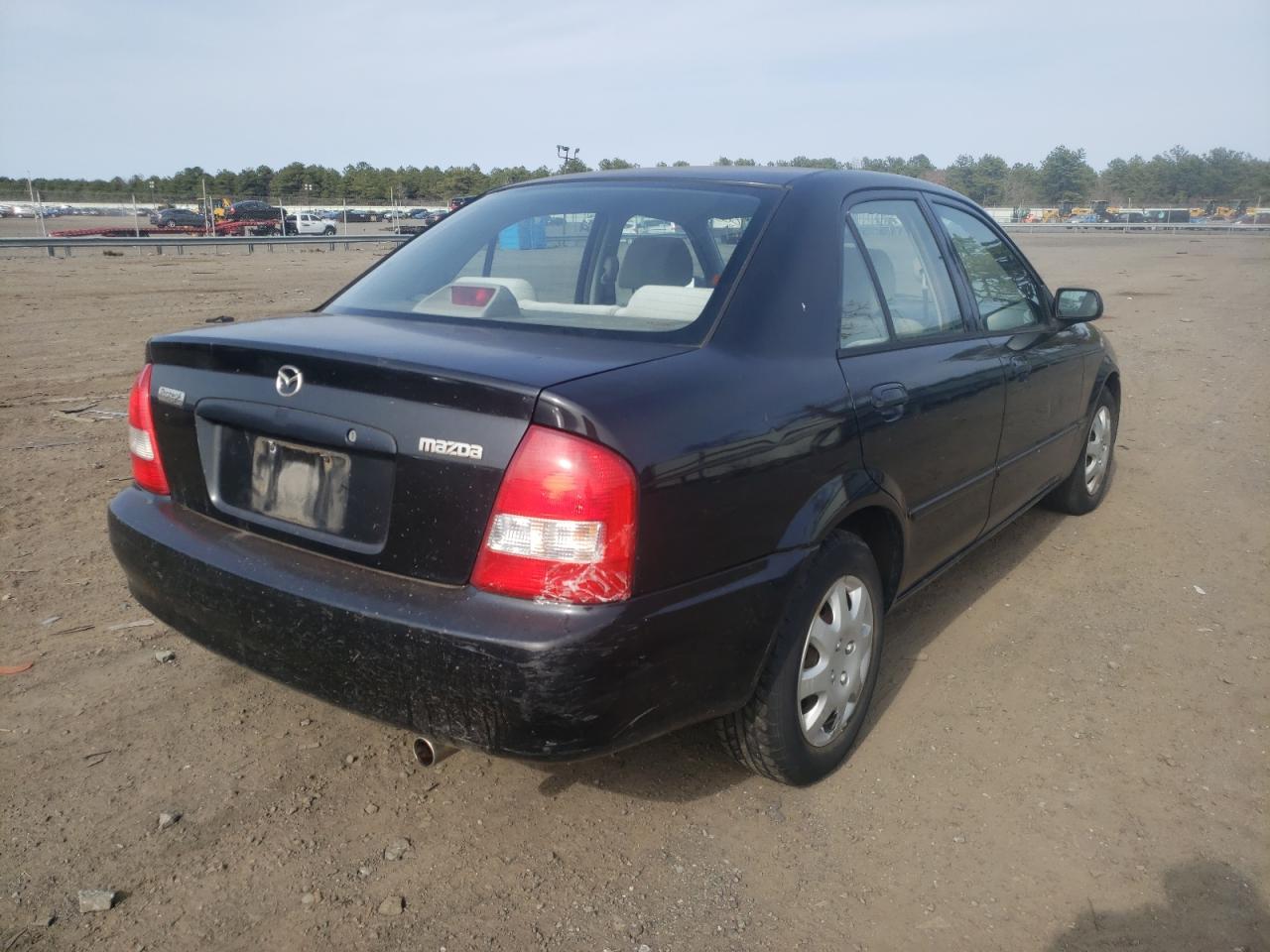 Photo 4 from auction – 1999 MAZDA PROTEGE DX with VIN JM1BJ2227X0152321