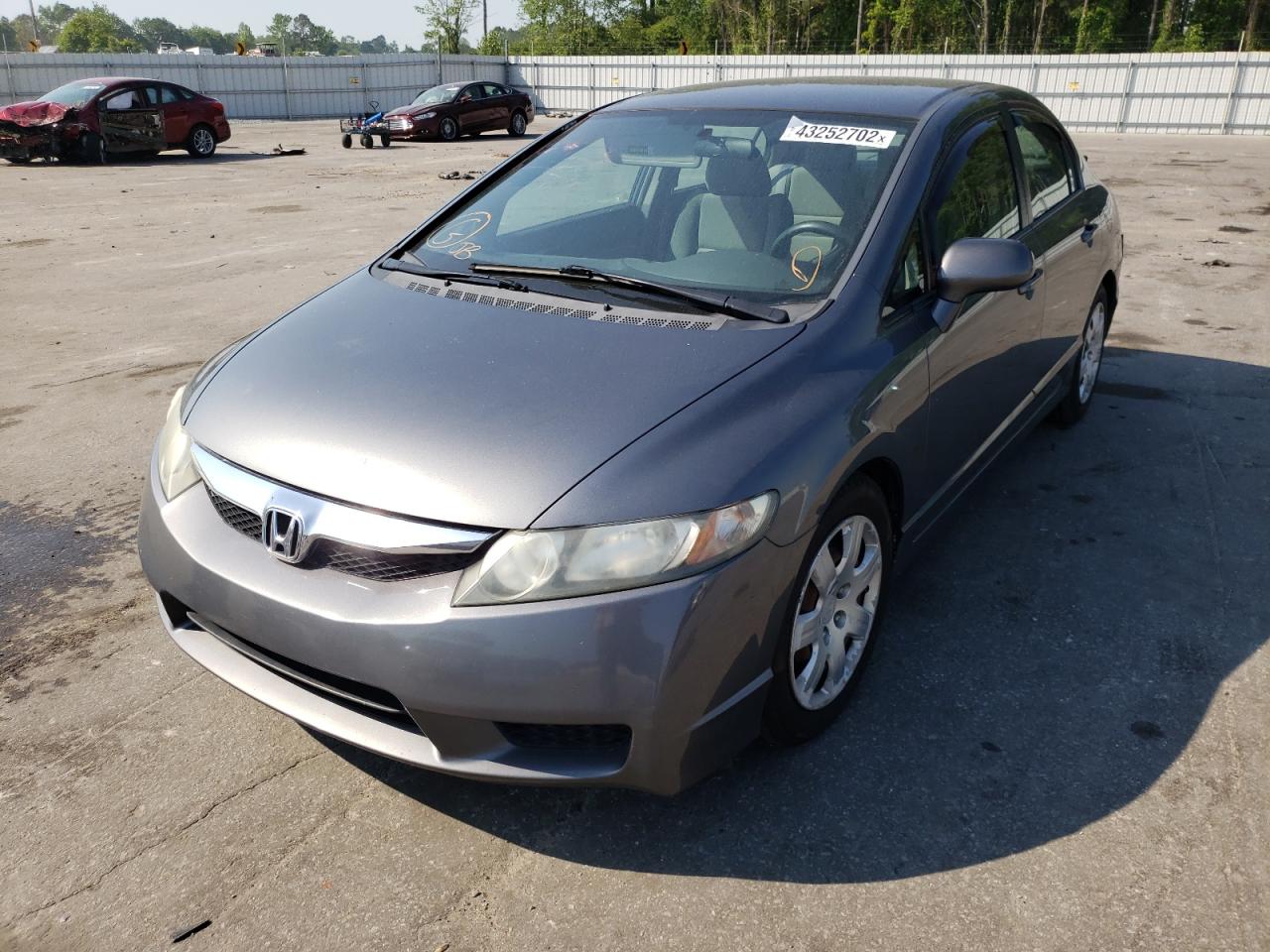Photo 2 from auction – 2011 HONDA CIVIC LX with VIN 19XFA1F59BE049918