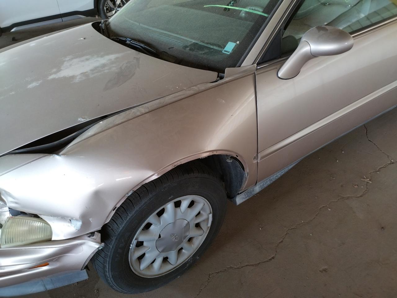 Photo 10 from auction – 1998 BUICK RIVIERA with VIN 1G4GD2210W4710467