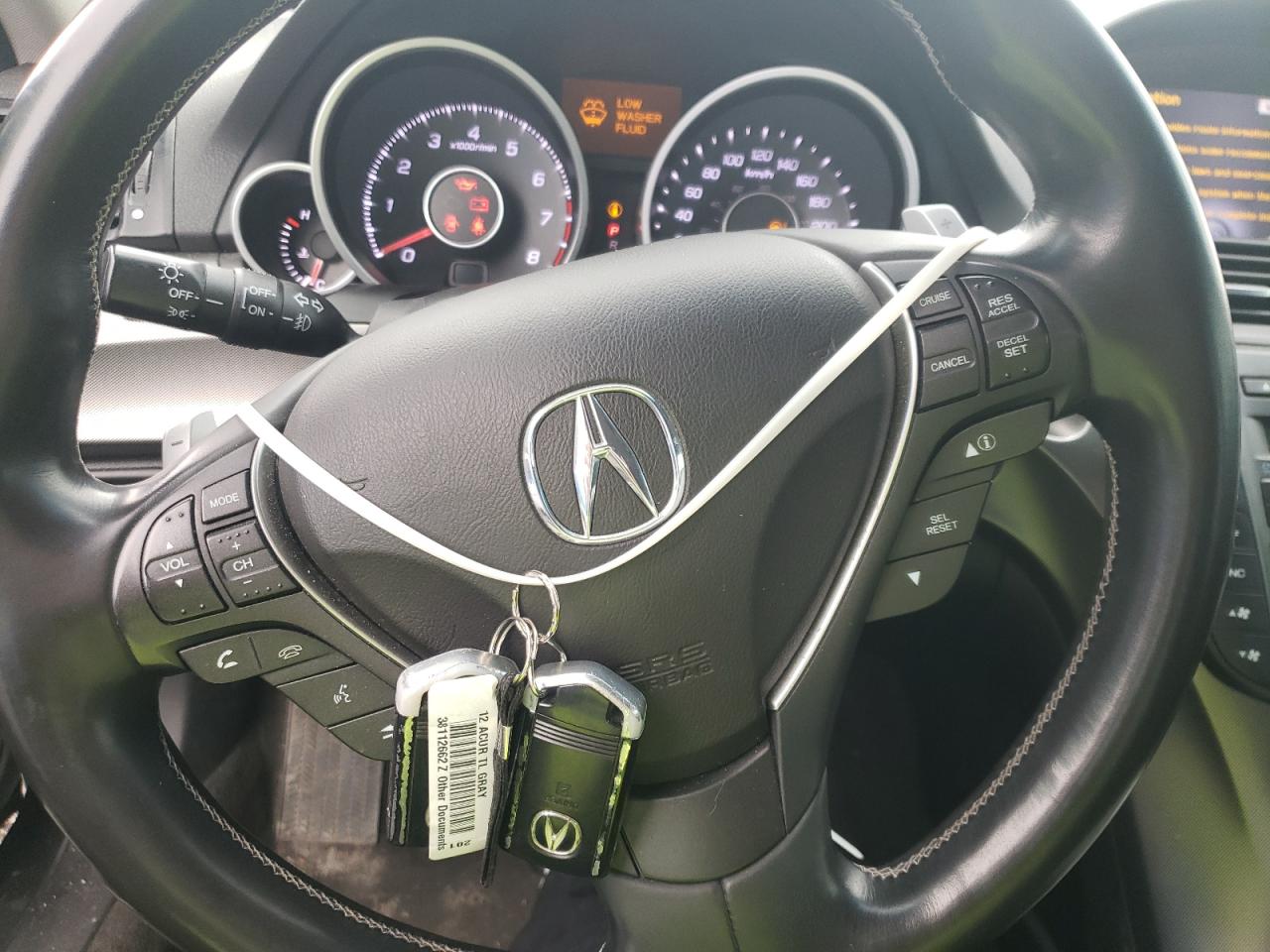 Photo 8 from auction – 2012 ACURA TL with VIN 19UUA9F51CA800831