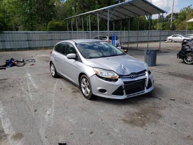 FORD FOCUS SE 2014 with VIN 1FADP3K20EL157410 - Photo from auction