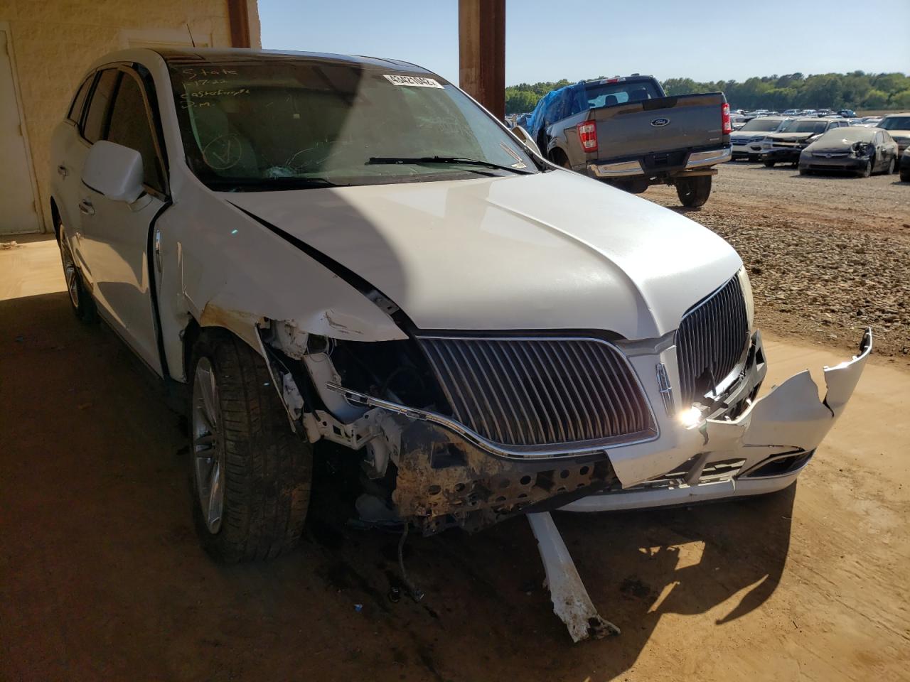 LINCOLN MKT 2014 with VIN 2LMHJ5AT3EBL52694 - Photo from auction