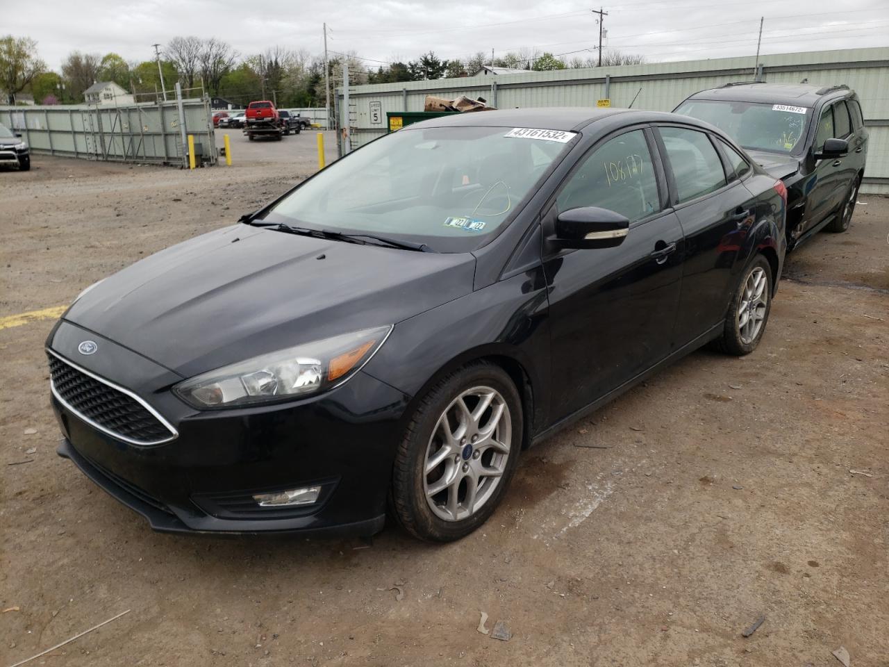 Photo 2 from auction – 2015 FORD FOCUS SE with VIN 1FADP3F21FL234281