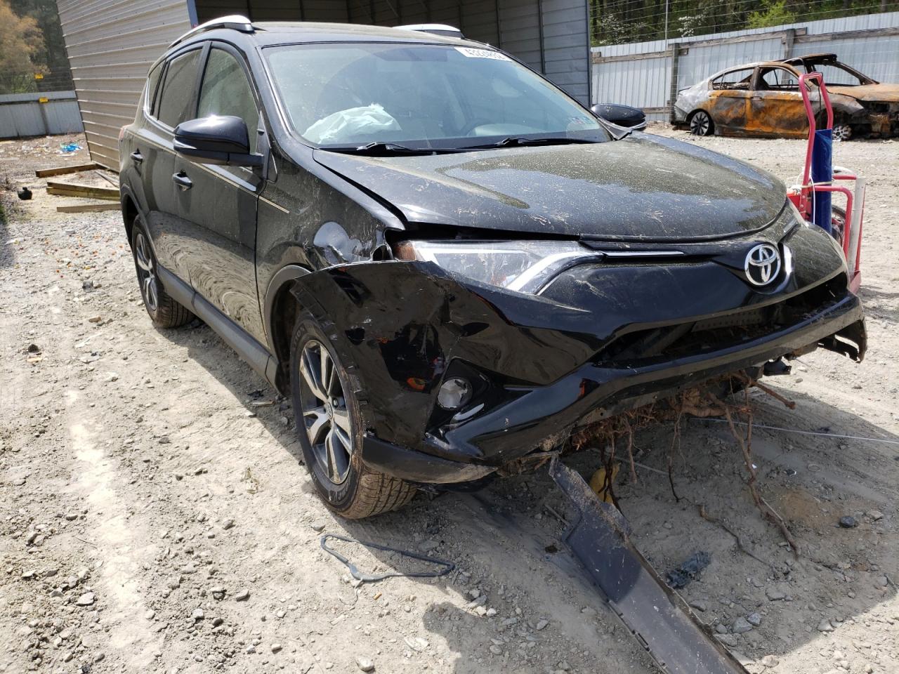 TOYOTA RAV4 XLE 2016 with VIN 2T3RFREV9GW426029 - Photo from auction