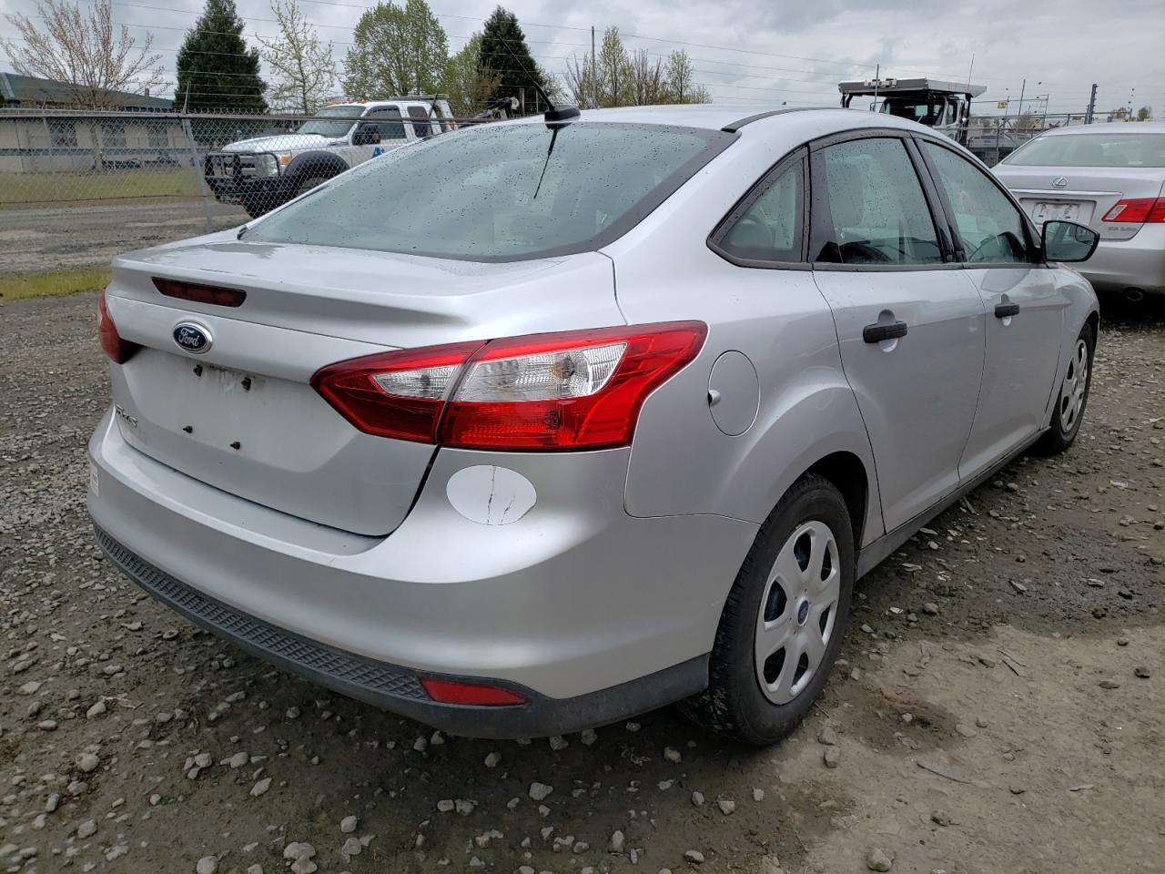 Photo 4 from auction – 2014 FORD FOCUS S with VIN 1FADP3E21EL211325