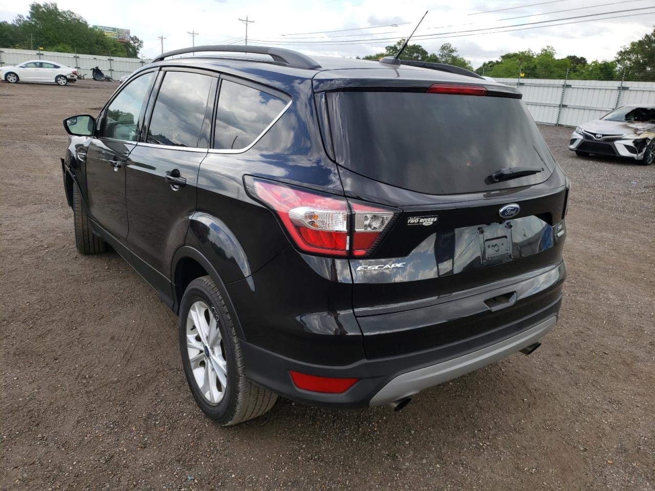 Photo 3 from auction – 2018 FORD ESCAPE SE with VIN 1FMCU0GD3JUB03350