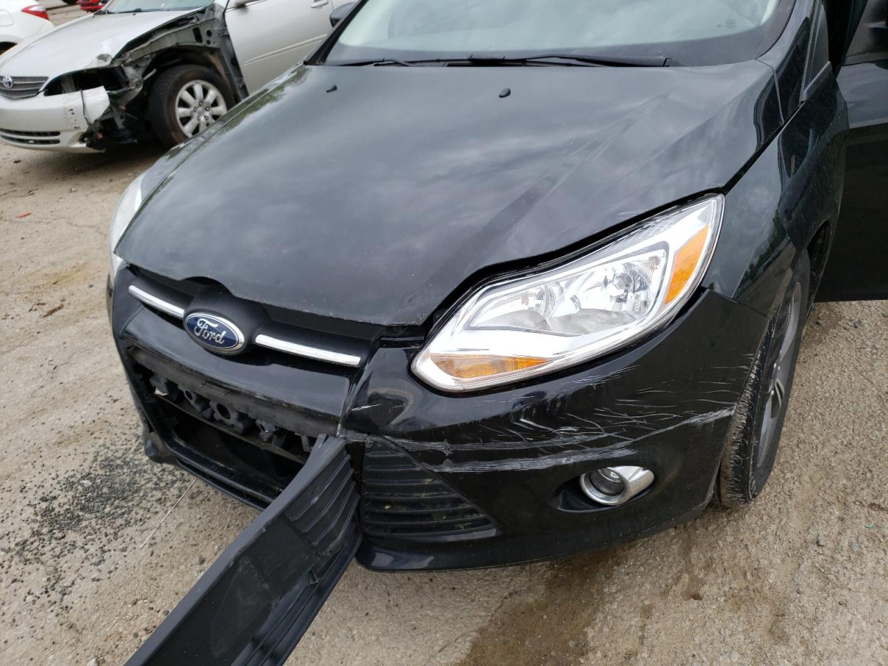 Photo 9 from auction – 2014 FORD FOCUS SE with VIN 1FADP3K21EL128921