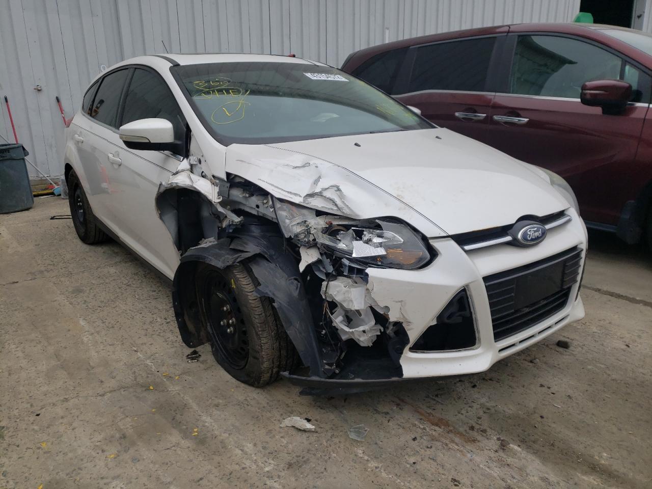 FORD FOCUS TITA 2012 with VIN 1FAHP3N20CL419064 - Photo from auction