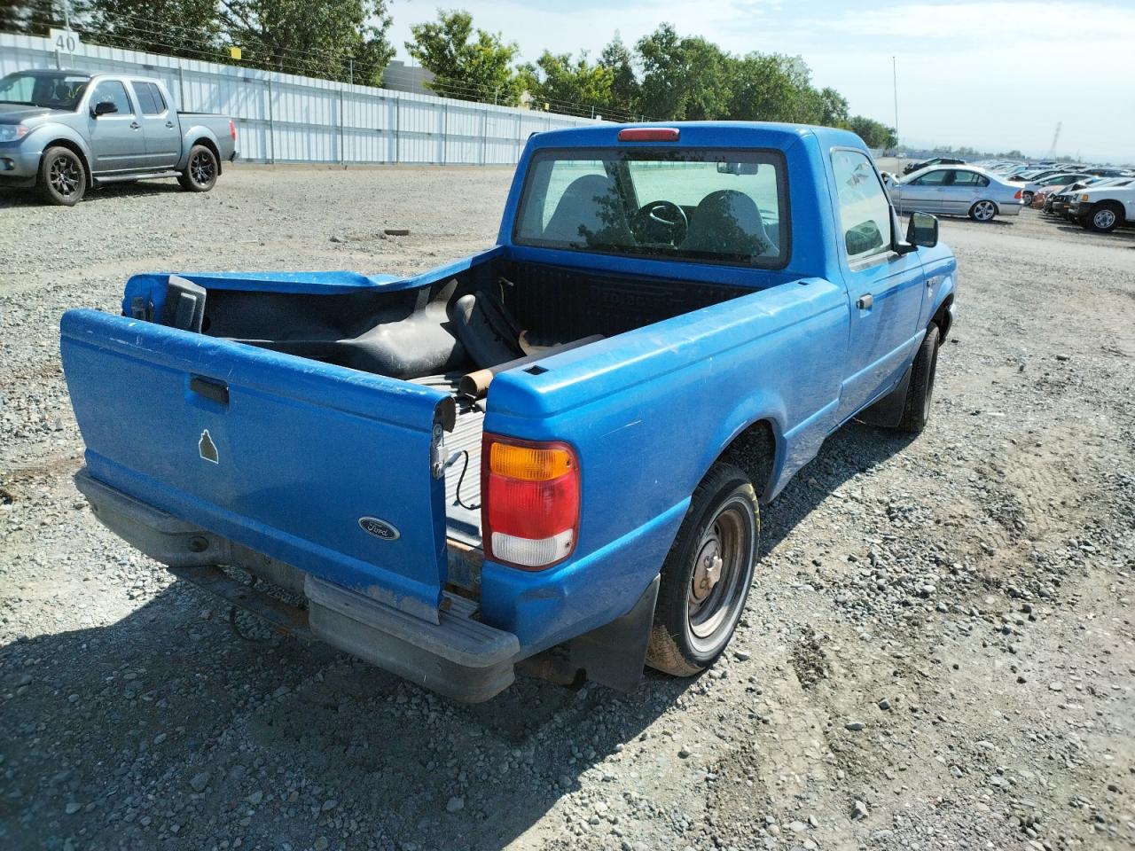 Photo 4 from auction – 1999 FORD RANGER with VIN 1FTYR10C9XUB07009