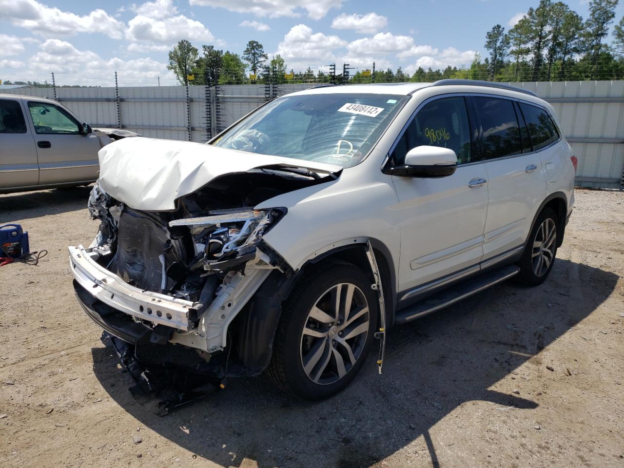 Photo 2 from auction – 2016 HONDA PILOT ELIT with VIN 5FNYF6H01GB116327