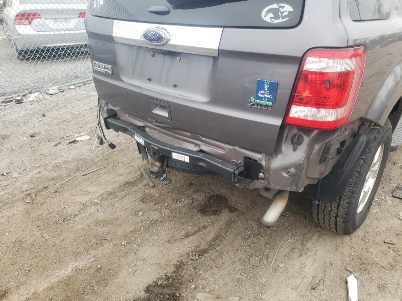 Photo 9 from auction – 2011 FORD ESCAPE LIM with VIN 1FMCU9EG5BKC60361