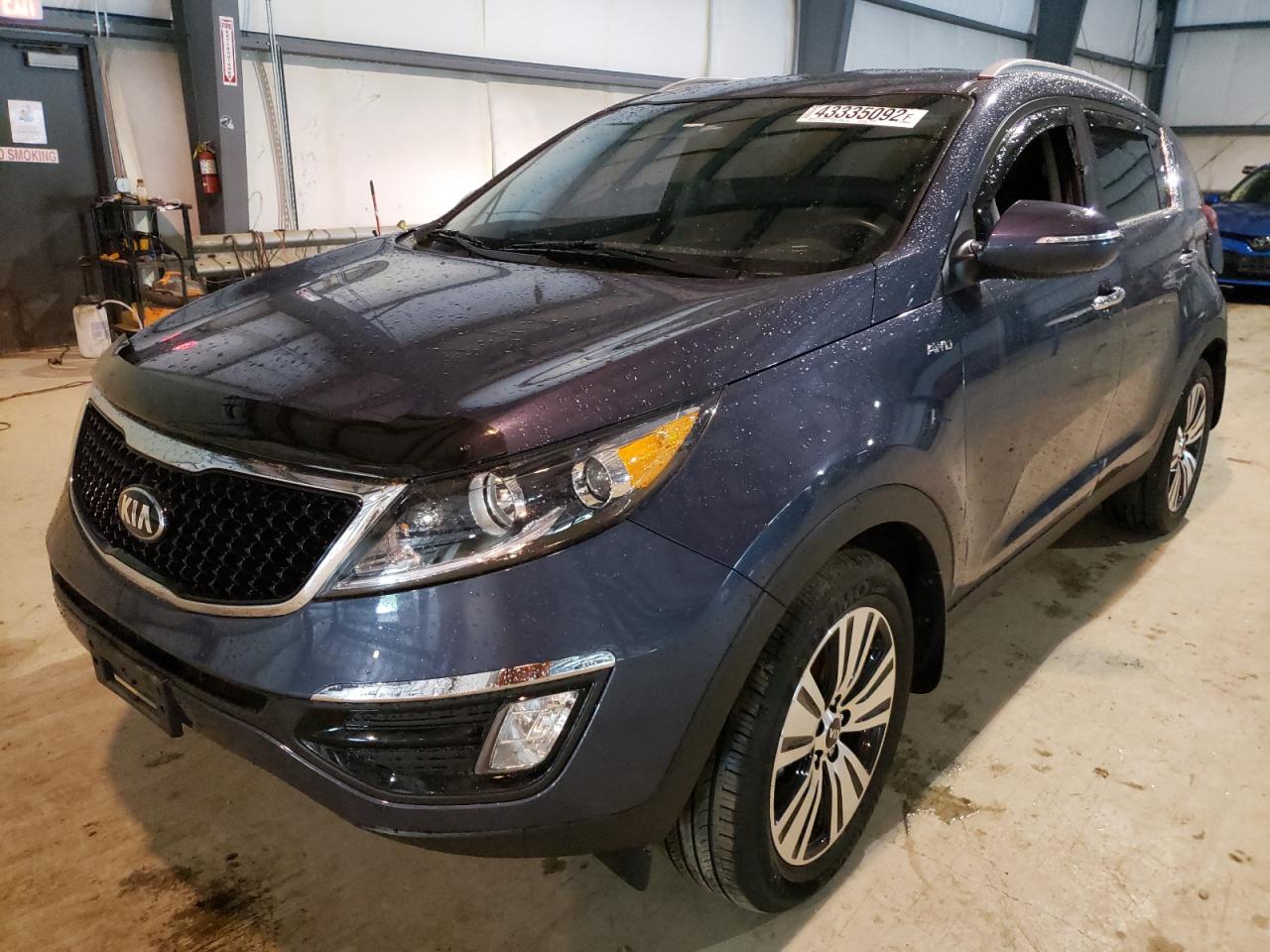 Photo 2 from auction – 2014 KIA SPORTAGE E with VIN KNDPCCACXE7574605