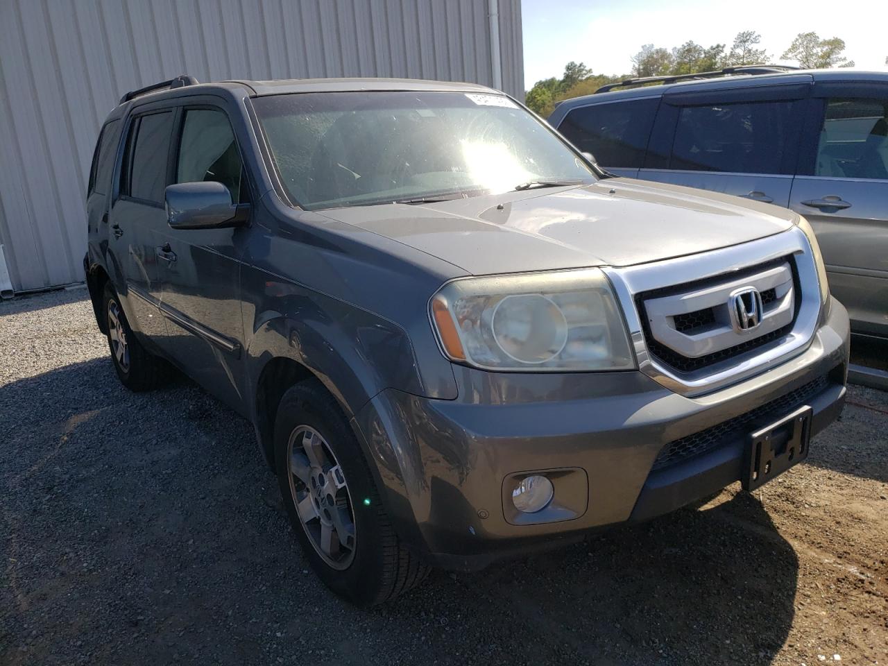 Photo 1 from auction – 2009 HONDA PILOT TOUR with VIN 5FNYF488X9B022377