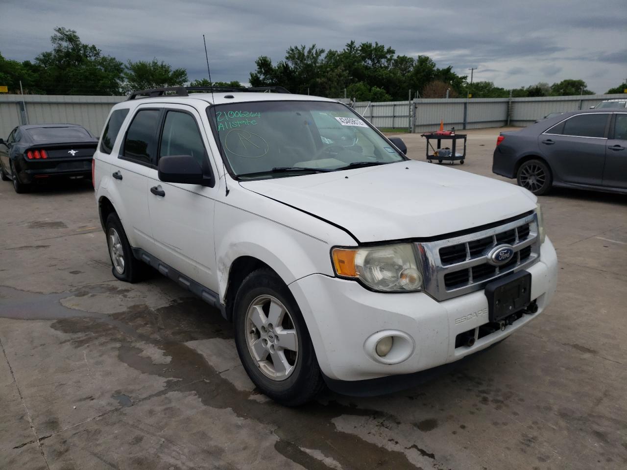 FORD ESCAPE XLT 2011 with VIN 1FMCU9DG1BKB85689 - Photo from auction