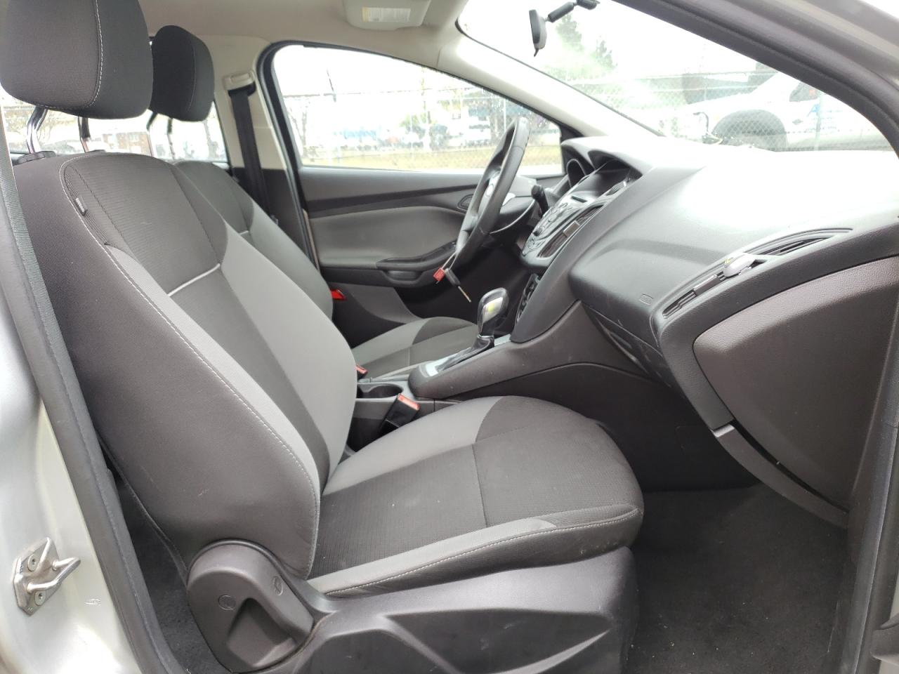 Photo 5 from auction – 2014 FORD FOCUS S with VIN 1FADP3E21EL211325