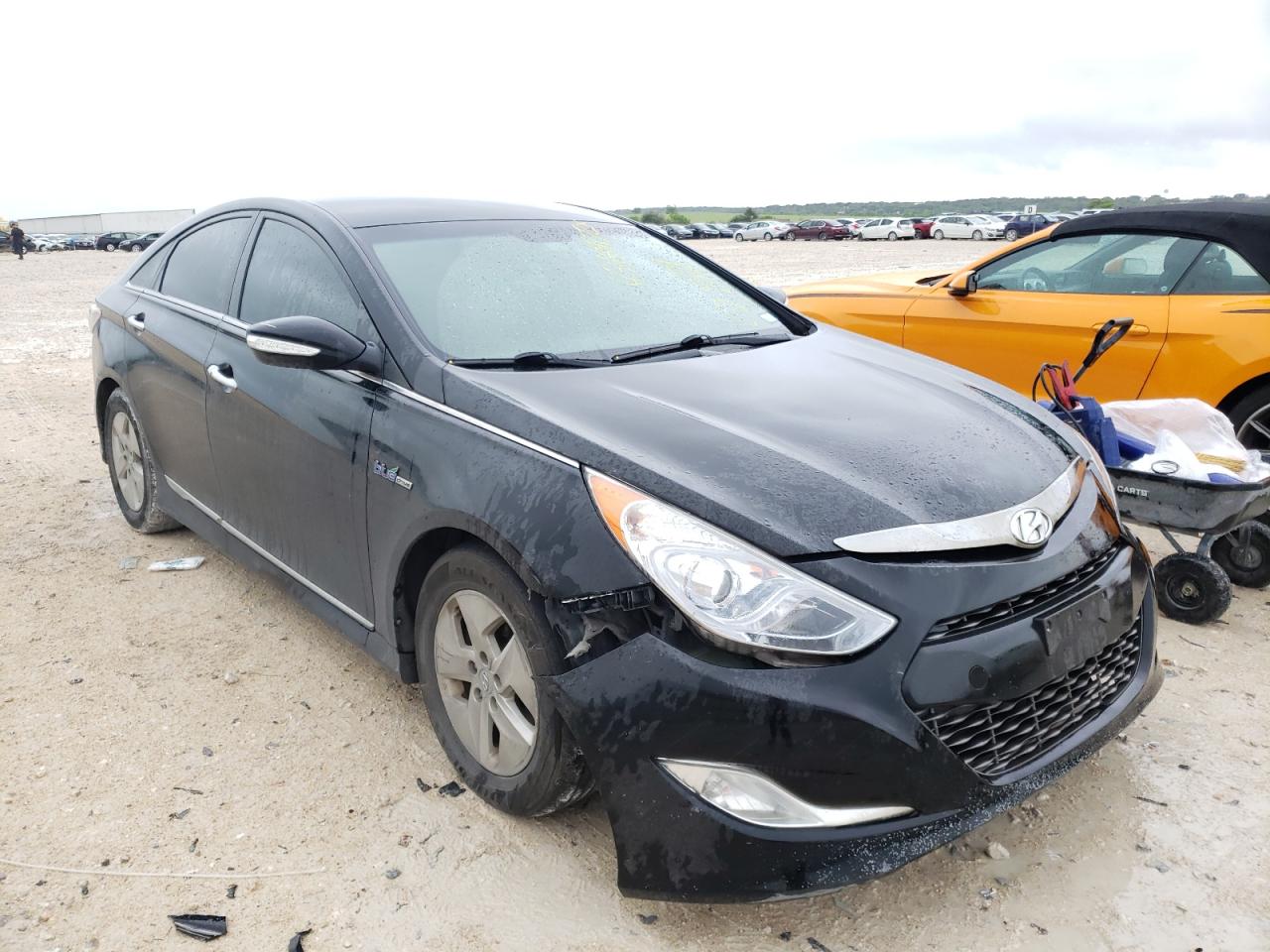 HYUNDAI SONATA HYB 2012 with VIN KMHEC4A4XCA034298 - Photo from auction