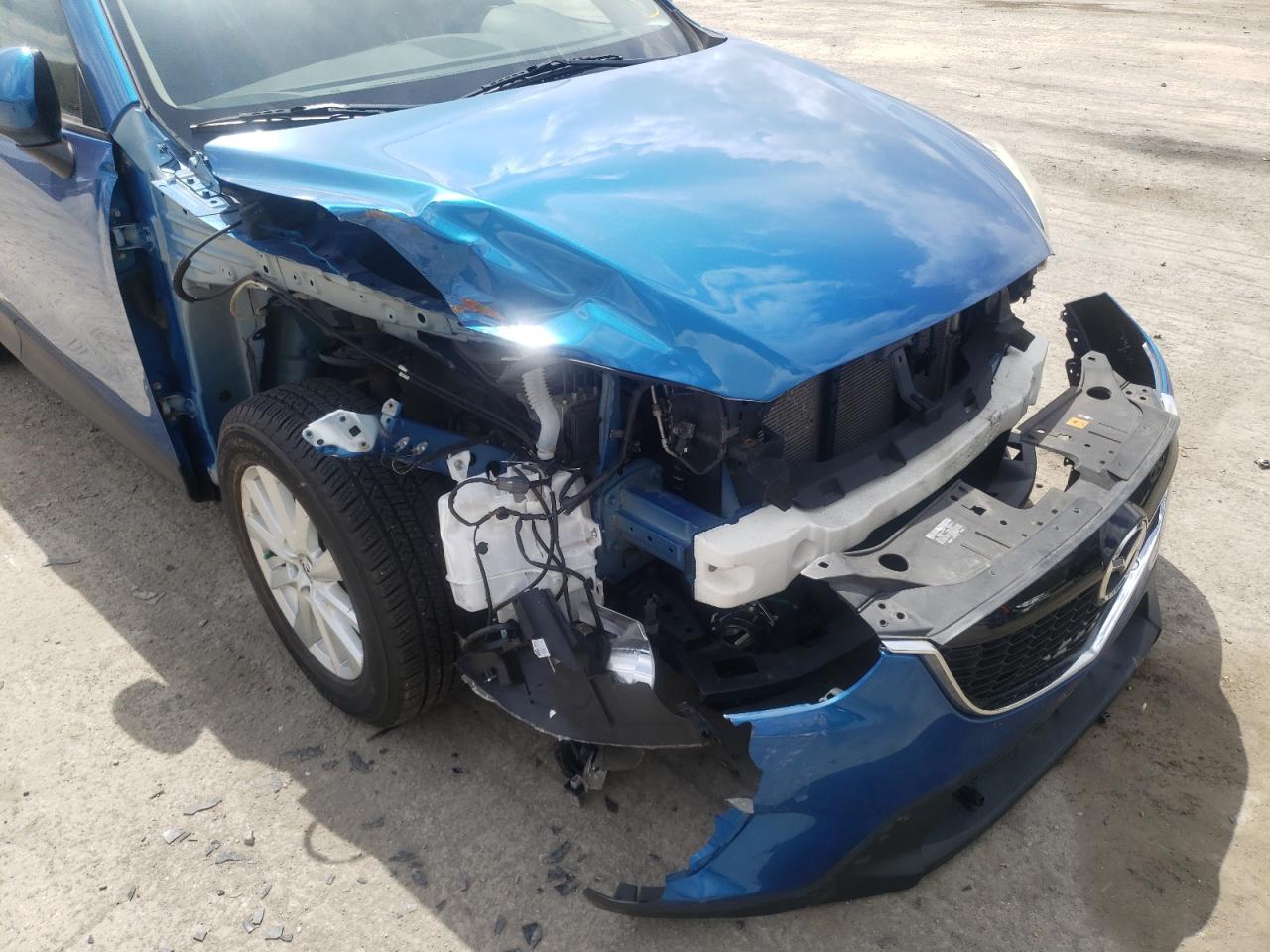 Photo 9 from auction – 2013 MAZDA CX-5 SPORT with VIN JM3KE4BE0D0161410