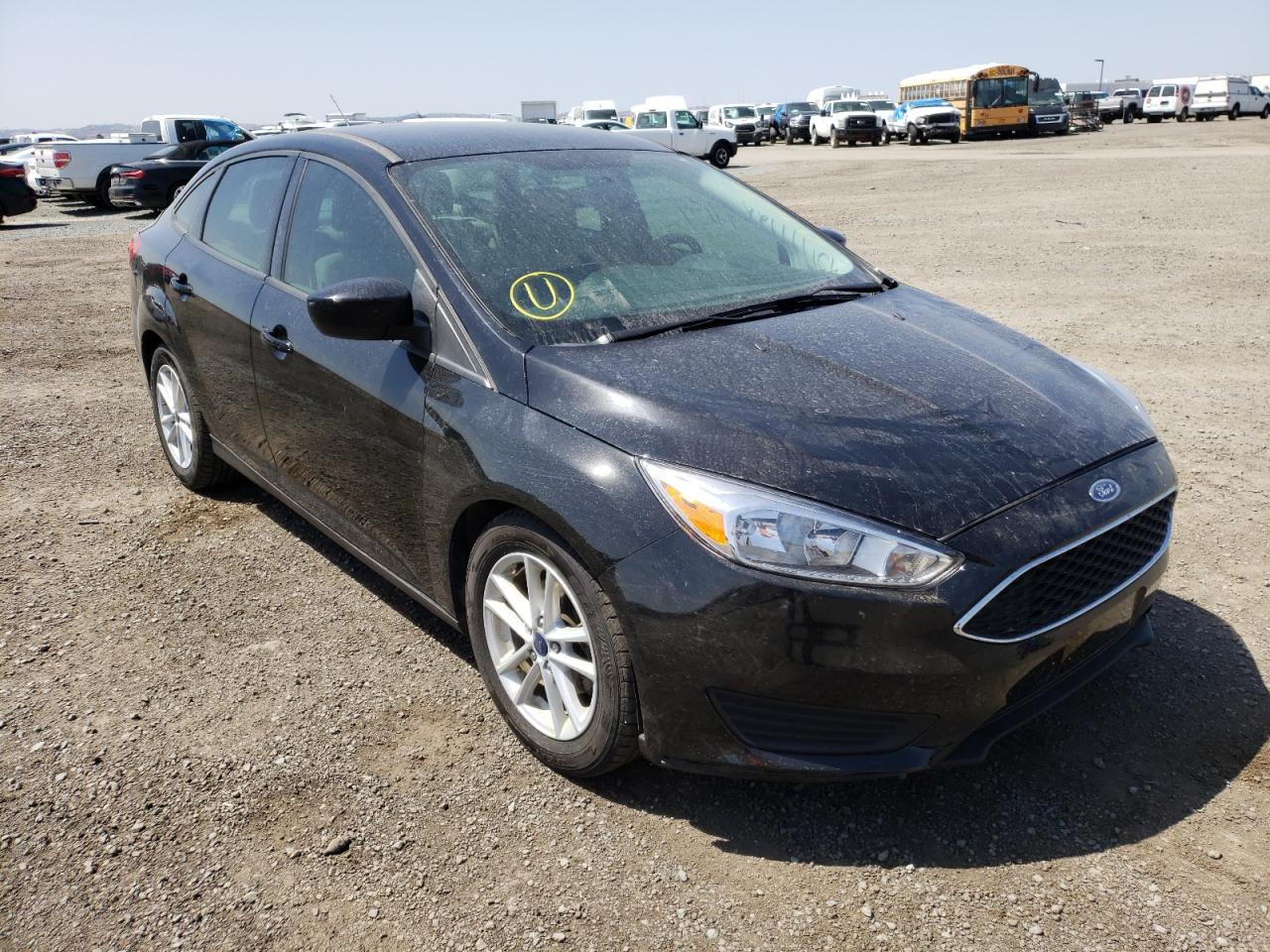 FORD FOCUS SE 2018 with VIN 1FADP3F24JL284407 - Photo from auction