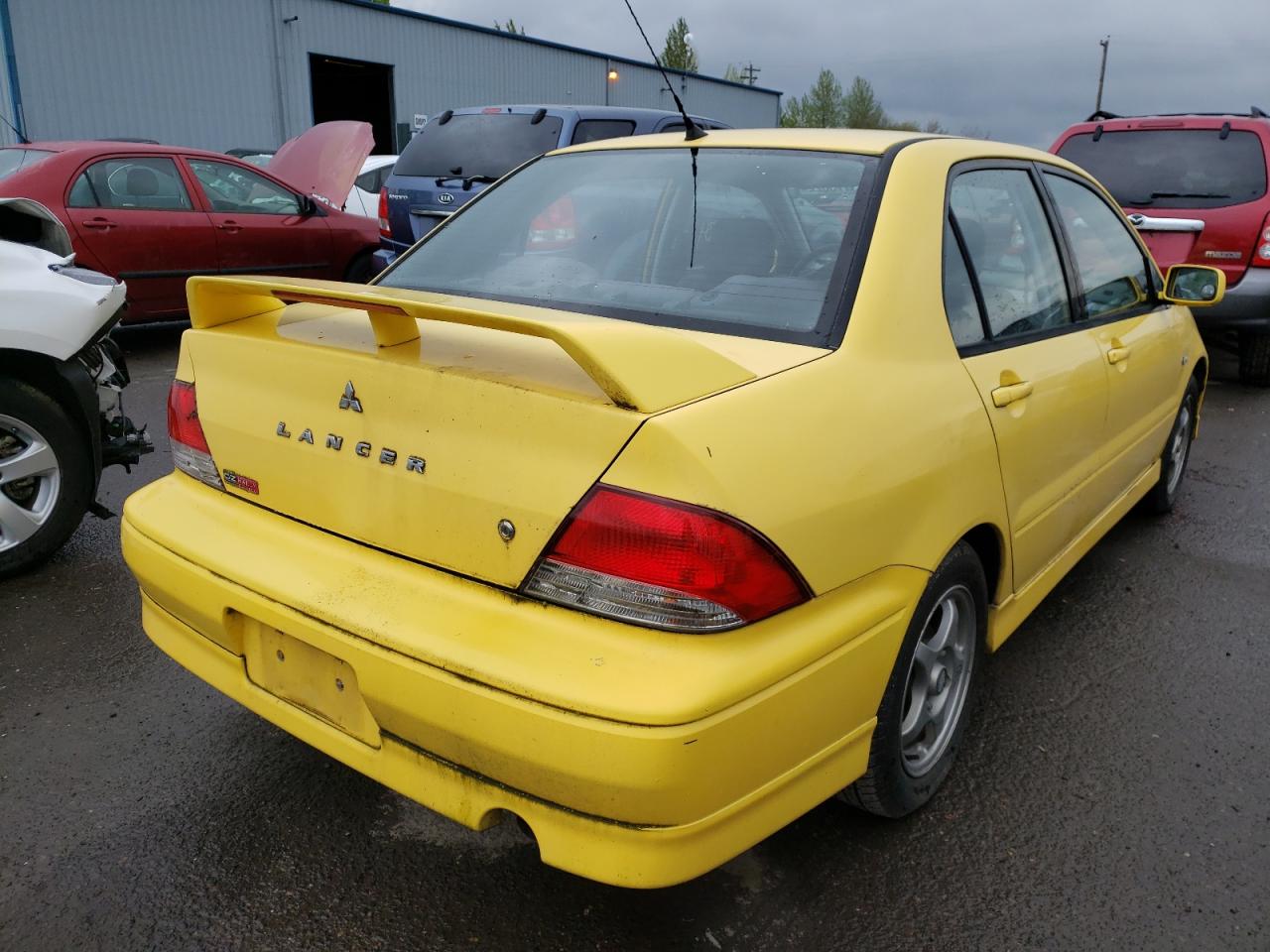 Foto 4 de la subasta – 2002 MITSUBISHI LANCER OZ con VIN JA3AJ86E22U040237