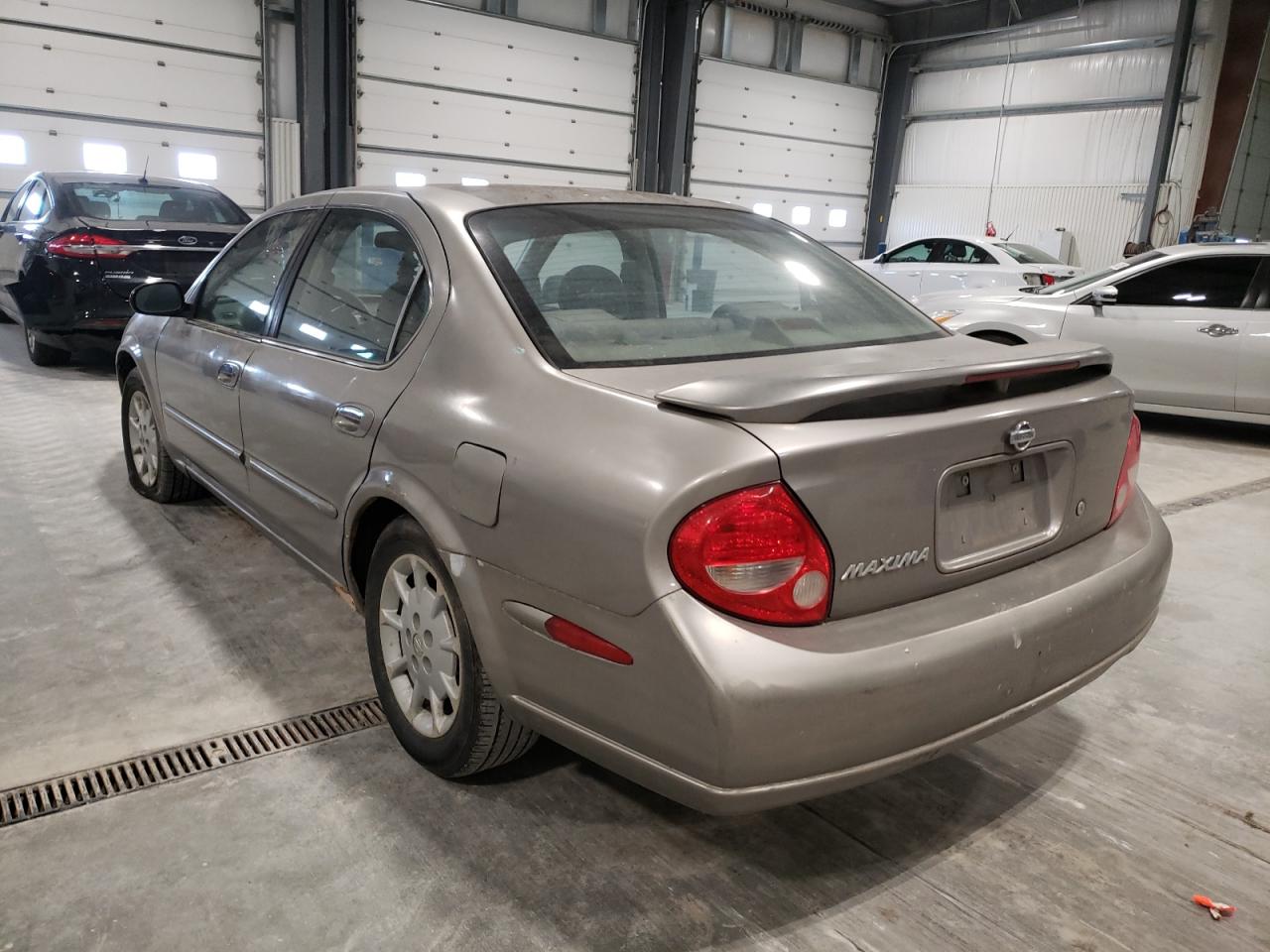 Photo 3 from auction – 2001 NISSAN MAXIMA GXE with VIN JN1CA31D61T625048