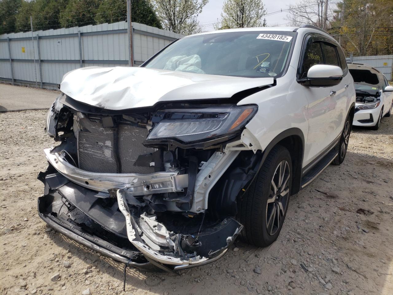 Photo 2 from auction – 2021 HONDA PILOT TOUR with VIN 5FNYF6H95MB038550