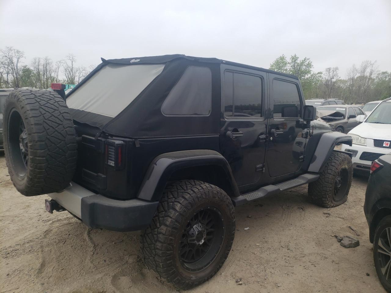 Photo 4 from auction – 2011 JEEP WRANGLER U with VIN 1J4BA5H11BL577664