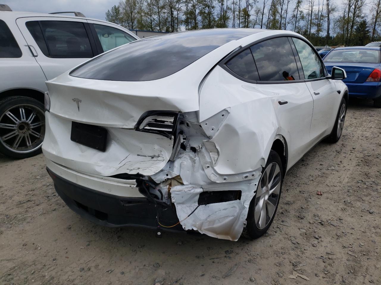 Photo 4 from auction – 2021 TESLA MODEL Y with VIN 5YJYGDEEXMF065729