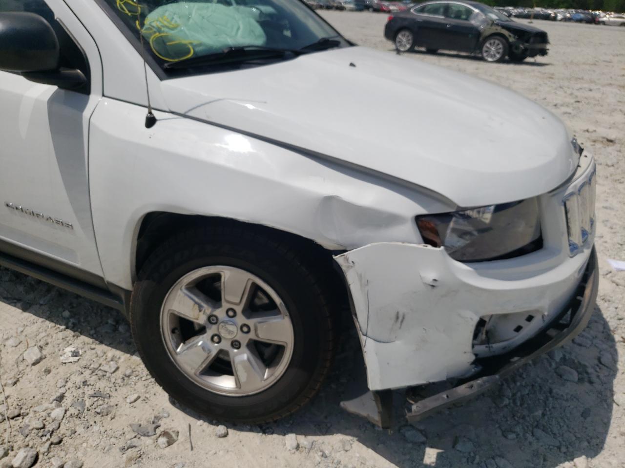 Photo 9 from auction – 2014 JEEP COMPASS SP with VIN 1C4NJCBA2ED843806