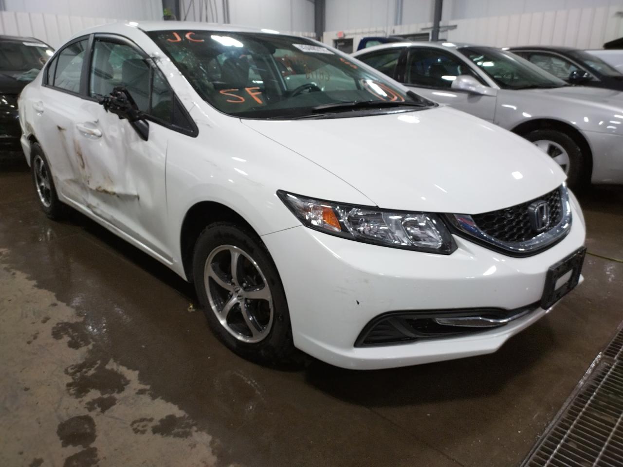 HONDA CIVIC SE 2015 with VIN 2HGFB2F72FH509646 - Photo from auction