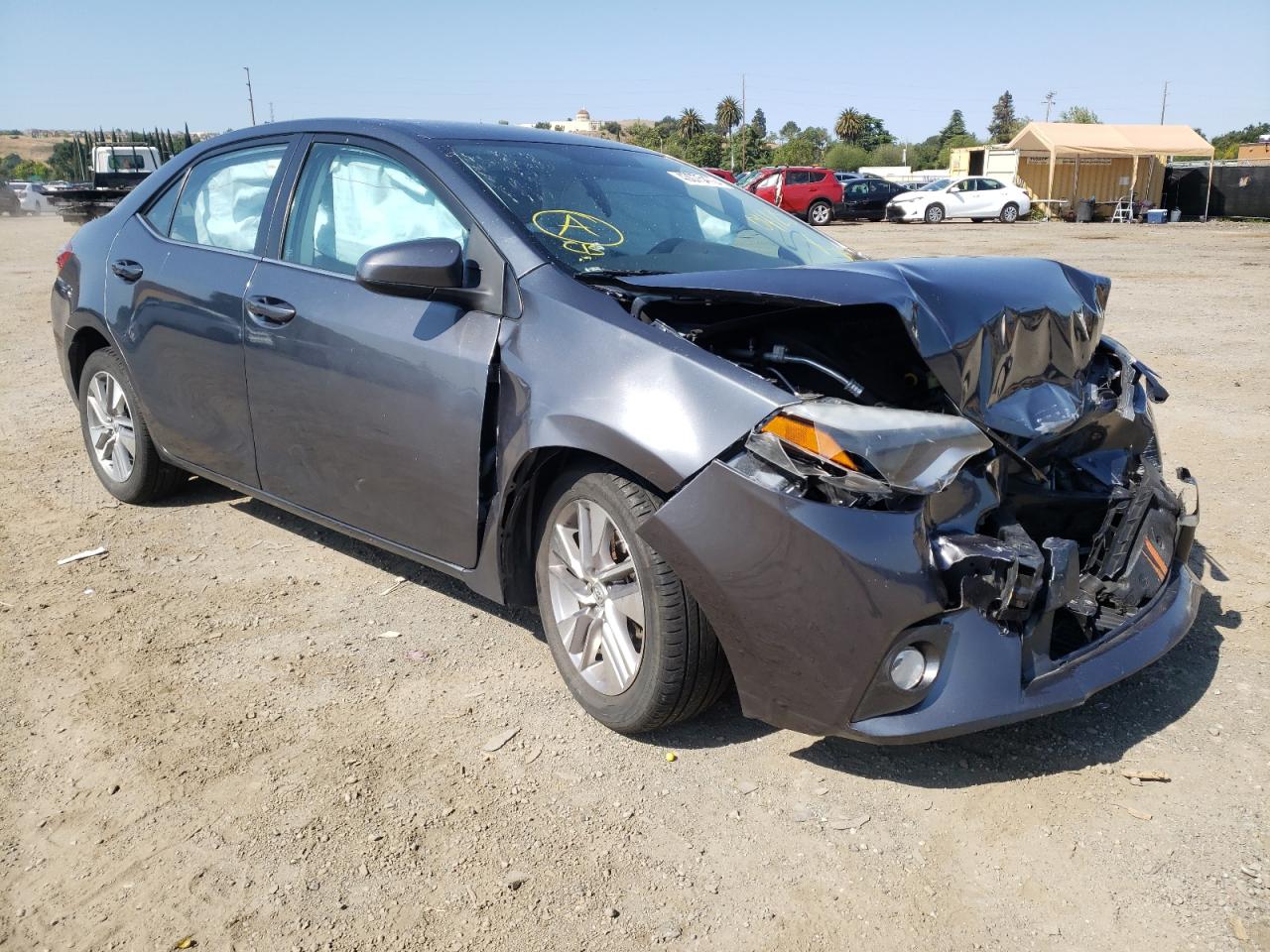 TOYOTA COROLLA EC 2015 with VIN 2T1BPRHE9FC388062 - Photo from auction