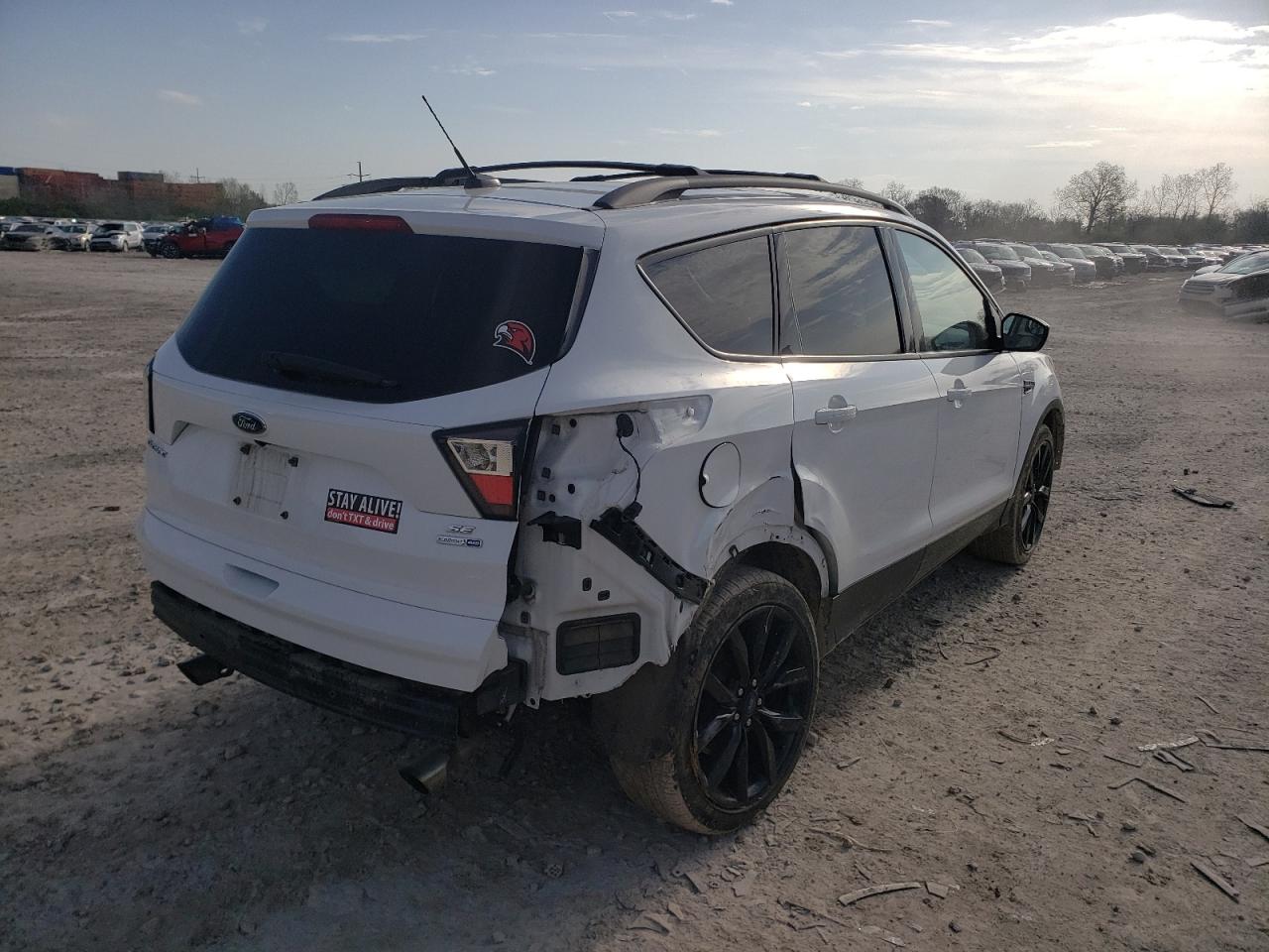 Photo 4 from auction – 2017 FORD ESCAPE SE with VIN 1FMCU9GD0HUD57175