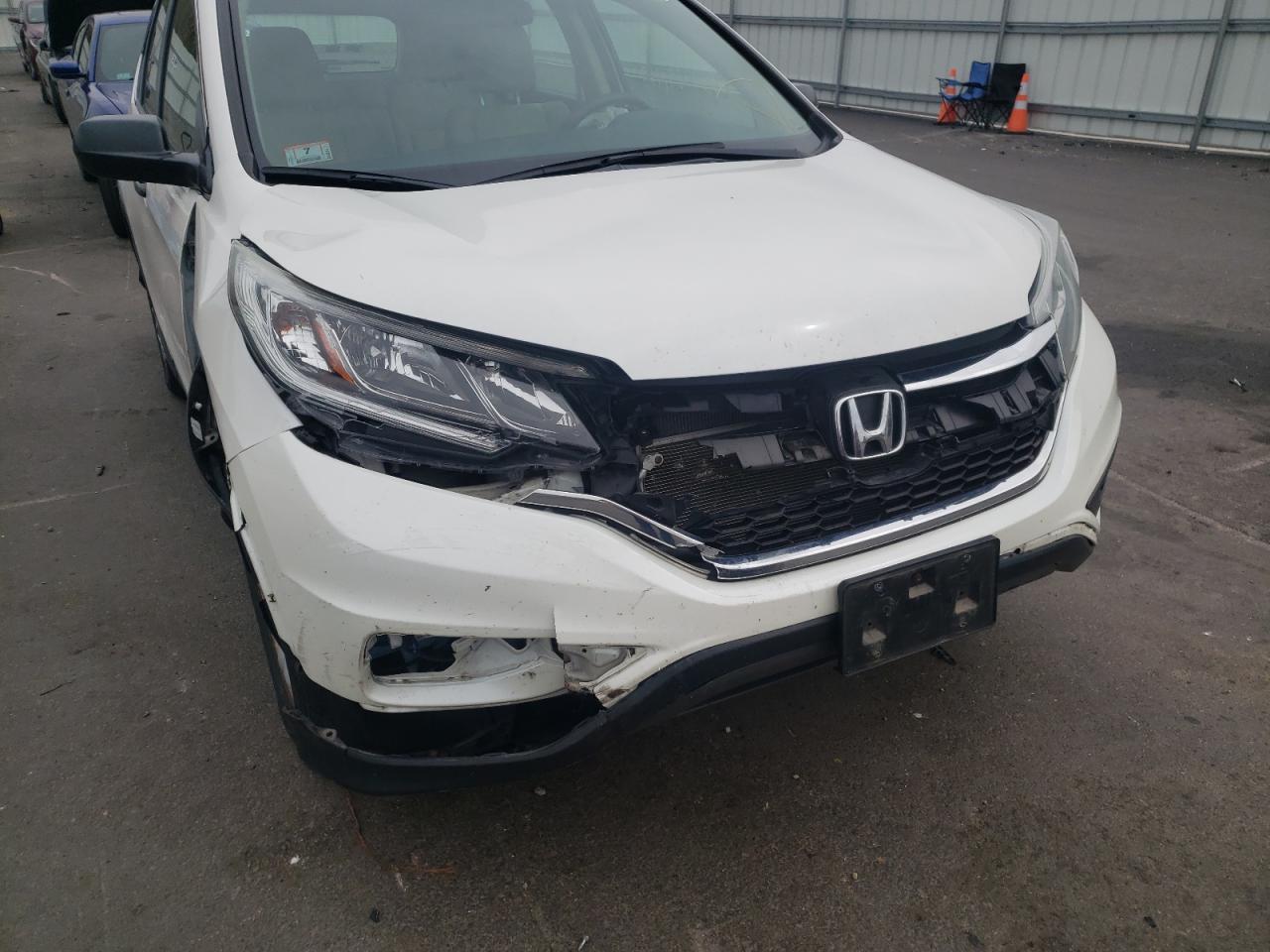Photo 9 from auction – 2016 HONDA CR-V LX with VIN 5J6RM4H36GL042760