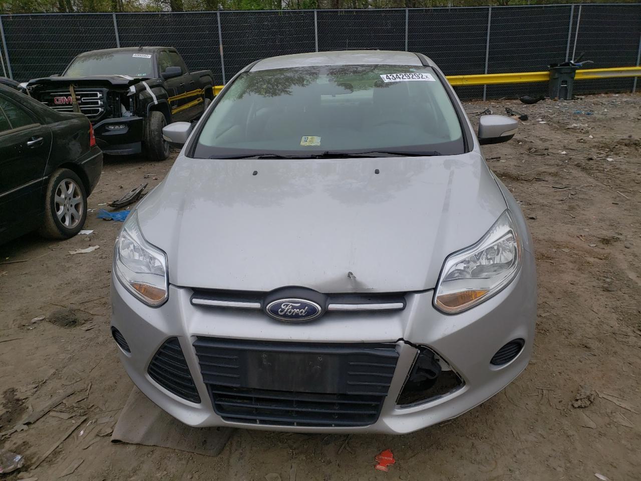 Photo 9 from auction – 2013 FORD FOCUS SE with VIN 1FADP3F25DL208084