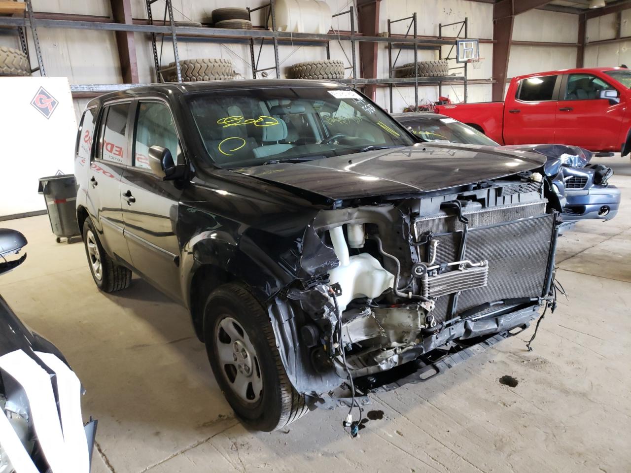 HONDA PILOT LX 2011 with VIN 5FNYF4H28BB025537 - Photo from auction
