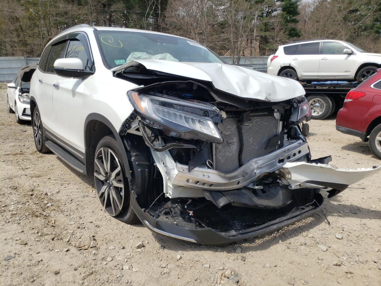 HONDA PILOT TOUR 2021 with VIN 5FNYF6H95MB038550 - Photo from auction