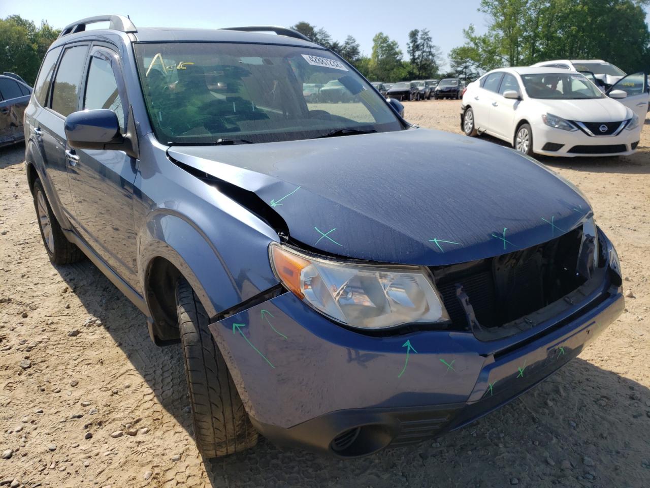 SUBARU FORESTER 2 2011 with VIN JF2SHADC5BH770485 - Photo from auction