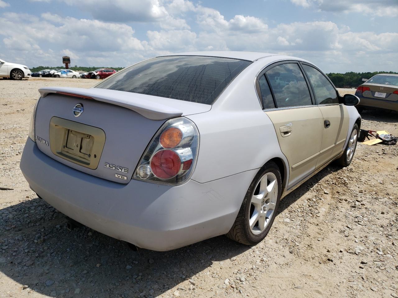 Photo 4 from auction – 2002 NISSAN ALTIMA SE with VIN 1N4BL11E92C144475