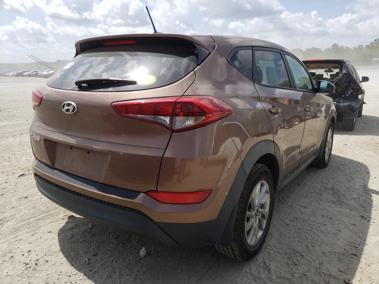 Photo 4 from auction – 2016 HYUNDAI TUCSON SE with VIN KM8J23A44GU179076