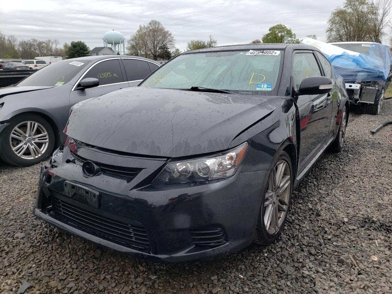 Photo 2 from auction – 2011 TOYOTA SCION TC with VIN JTKJF5C70B3016119