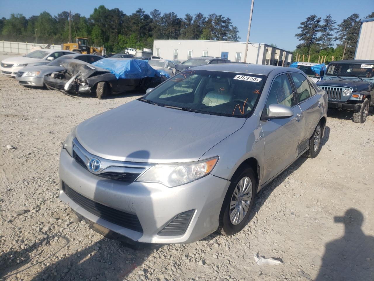 Photo 2 from auction – 2014 TOYOTA CAMRY HYBR with VIN 4T1BD1FK3EU119006