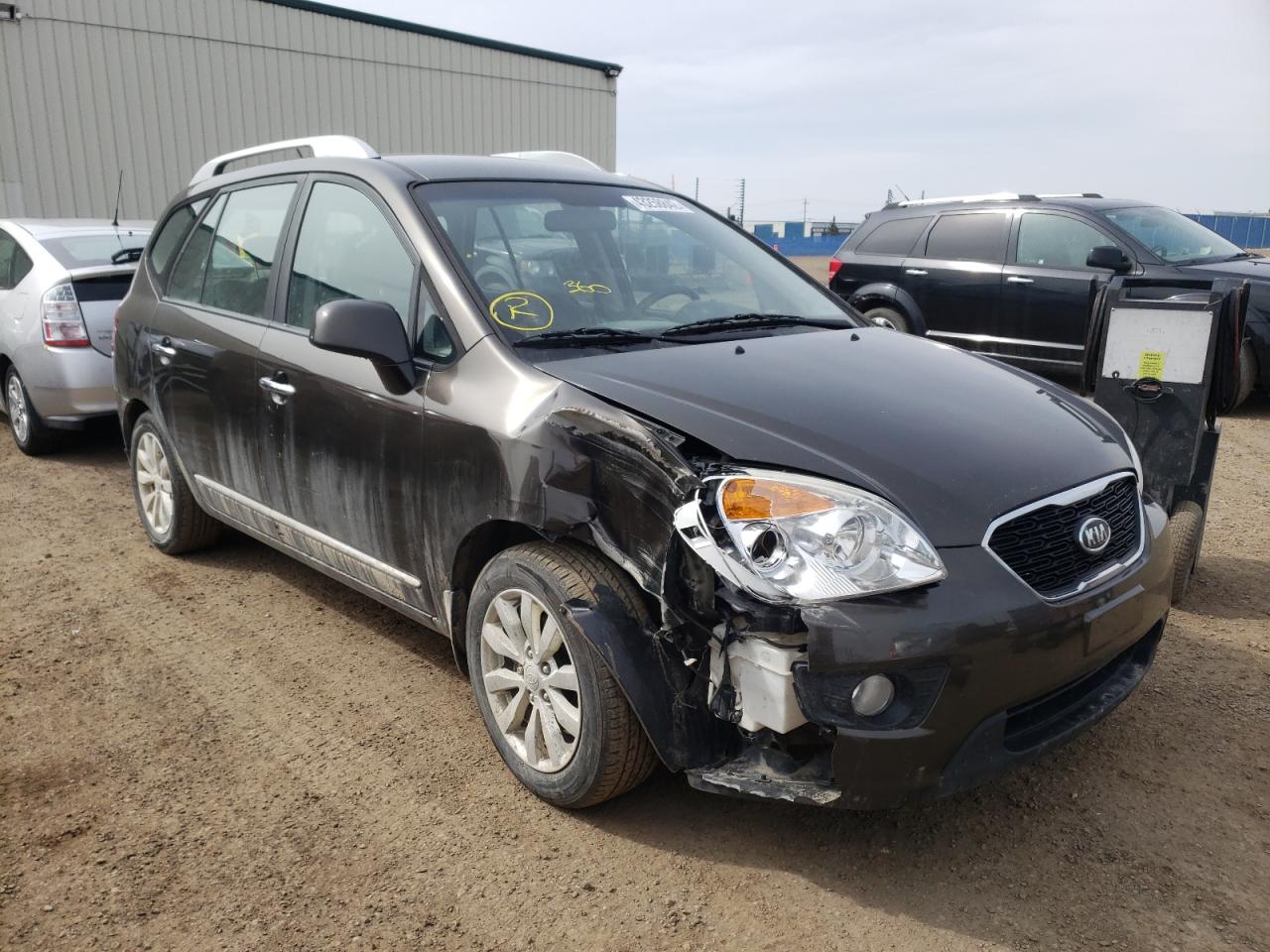 KIA RONDO 2011 with VIN KNAHH8A89B7338311 - Photo from auction