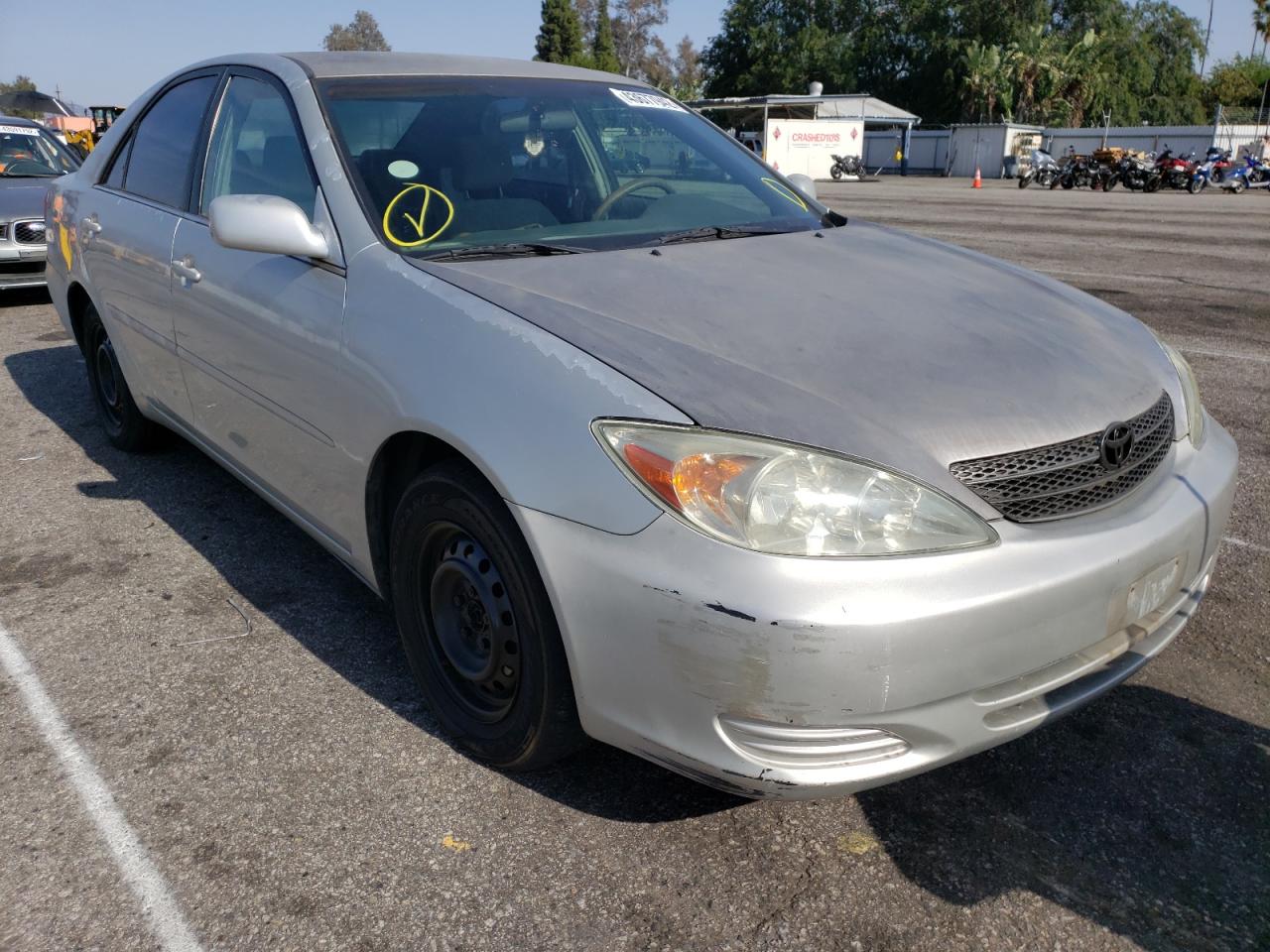TOYOTA CAMRY LE 2003 with VIN 4T1BE32K93U715670 - Photo from auction