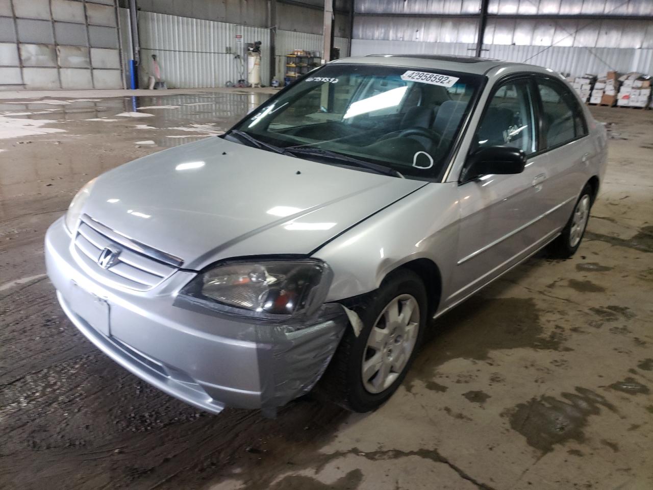 Photo 2 from auction – 2002 HONDA CIVIC DX with VIN 1HGES26752L075280